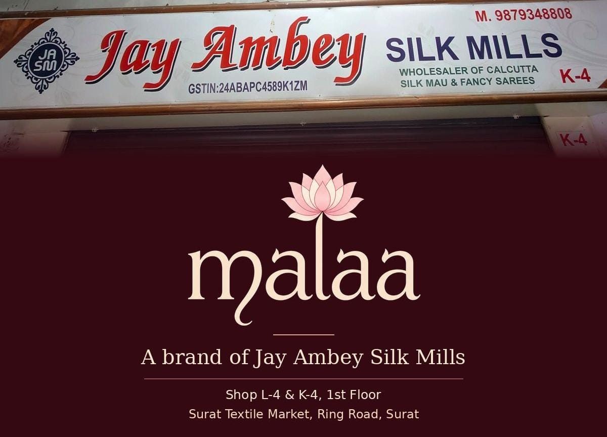 Surat Textile Market mein Malaa ki dukaan ka board, online saree wholesale se pehle asli dukaan check karein